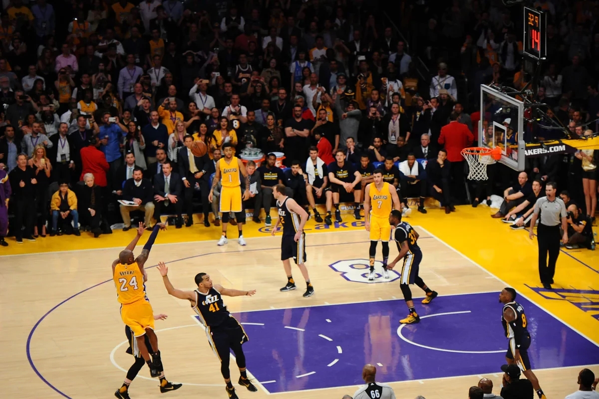 Kobe Bryant rises for what would be the game winning shot over Trey Lyles with 32.9 seconds remaining in the game.